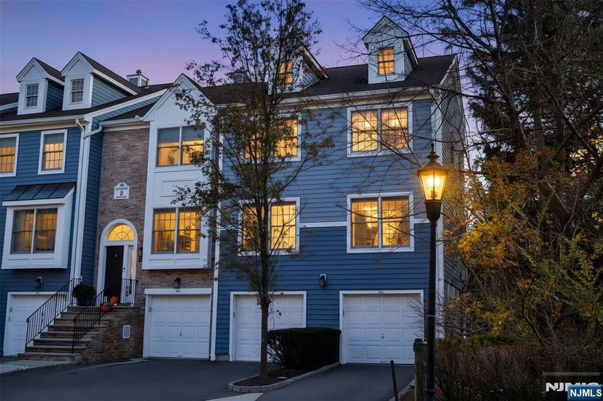 **Stunning, Fully Renovated End-Unit Townhome - Cambridge Heights!** Welcome to this beautifully updated 2-bedroom, 2 bath end unit townhouse in the desirable, gated Cambridge Heights community with 24 hour security. This move-in ready home offers modern comfort, abundant natural light, and exceptional living space. Step into the inviting foyer and head to the main level, where a spacious living room with skylights and a cozy wood burning fireplace awaits. The contemporary kitchen with adjoining dining area is ideal for everyday living and entertaining. The serene primary bedroom offers a walk-in closet and stylish ensuite bath, while a second bedroom, full hall bath, and convenient laundry area complete the main floor. Enjoy a private deck off the living room and kitchen - perfect for relaxing outdoors. A generous loft with double closet and attic storage adds great versatility for a home office, den, or potential 3rd bedroom. The oversized one car garage provides even more storage. Recent updates include new bathrooms, new flooring, newer furnace/AC, water heater, fresh interior paint, and more. You will love the easy access to major highways, Ramseyâ€™s charming downtown, shopping, and **nearby train and bus service for effortless commuting.** Don't miss the chance to make this beautifully renovated home your own - schedule your visit today!