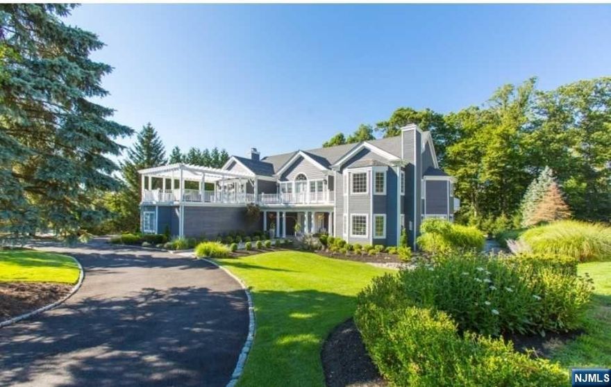 Exquisite one-of-a-kind custom-built classic Hamptons style estate home. The wow factor will astound from the curb! Lush landscape & unique architecture greet you as you approach the covered porch to enter. A stunning octagonal 2 story foyer as you enter that opens to outrageous soaring ceiling LR w/floor to ceiling stone FP & DR welcome you in. Glass doors from LR to game room that opens to covered patio is the pinnacle of entertaining! Gourmet updated Chef's kitchen w/prof grade appl., Quartz counters, wet bar, sep break room w/wall of glass that leads to patio & is completely open to FR anchored w/FP--just stunning! Two powder rooms, mud room & two-story library w/back stairs complete the main level. The upper level is a showstopper! Primary ste w/grand rotunda, dressing room, custom WIC, spa like bath & wrap around deck overl property is just breath taking. Upper-level loft that peers down into LR & foyer--elegant & grand! two addl gigantic bedrooms w/Jack &J ill Bath.