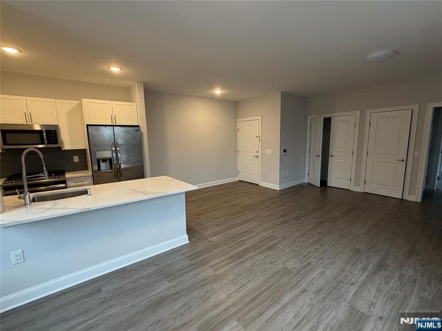 **FIRST MONTH FREE on a 13-month lease + one parking space included! - for occupancy commencing on or before 4/1/26!** Modern 1 bedroom apartment (AVAILABLE IMMEDIATELY on TOP FLOOR) with ample living & closet space. 40 Park features modern units with spacious floor plans & high end finishes. Some highlights include: beautiful modern kitchens with stainless steel GE appliances, full kitchen island, wood floors, large washer and dryer in each unit. Blocks away from the train for easy access to New York. Within blocks to all Park Ridge has to offer including brand new stores and restaurants. Less than 5 minutes from the brand new Shoppes at Dipiero Farms - featuring Wegmans, Chipotle, Starbucks and much more. PARKING - 1st assigned [outdoor, some are covered but can't guarantee a covered] space INCLUDED IN THE RENT! 40 Park Ave is pet friendly (lb limit + fees apply)! REDUCED rent security deposit offered to qualified applicants! Tenant is responsible for ALL utilities! Move-in fee applies! Virtual tour available upon request!