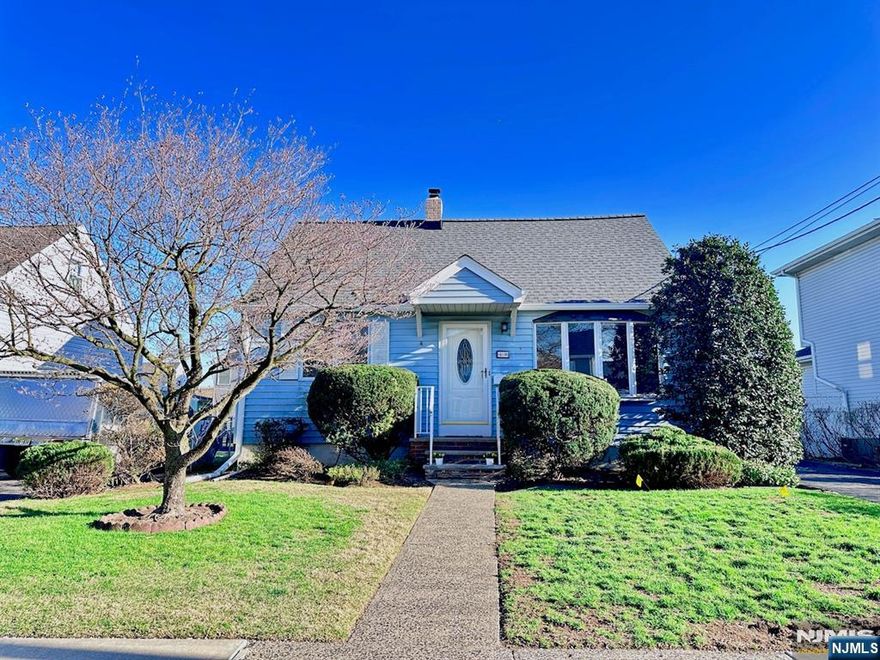Welcome to a charming Expanded Cape Cod style home where beauty meets comfort. The house includes a significant addition completed in 1984 and is much larger than it appears in photos. The total square footage is 2,200 SF, including a 500 SF finished basement. Spacious and meticulously maintained, this home is filled with natural sunlight and located on a quiet residential street. It features four bedrooms and two full bathrooms, along with two spacious living rooms, a large dining room, and an updated kitchen with brand new stainless steel appliances. The home also offers a fully finished basement for flexible use, as well as an accessible crawl space under the addition and garden shed for ample storage. Direct access from the second living room leads to a large deck and backyard, ideal for outdoor entertaining or relaxation. Recent upgrades include a new roof, modern lighting, new parquet hardwood and LVT flooring throughout, and freshly painted walls and ceilings. On site parking is available in the driveway for two or more cars. This prime location sits in a quiet, friendly neighborhood with close proximity to major highways and public transportation to NYC, as well as shops, schools, and restaurants. Enjoy modern, comfortable living in a charming town!
