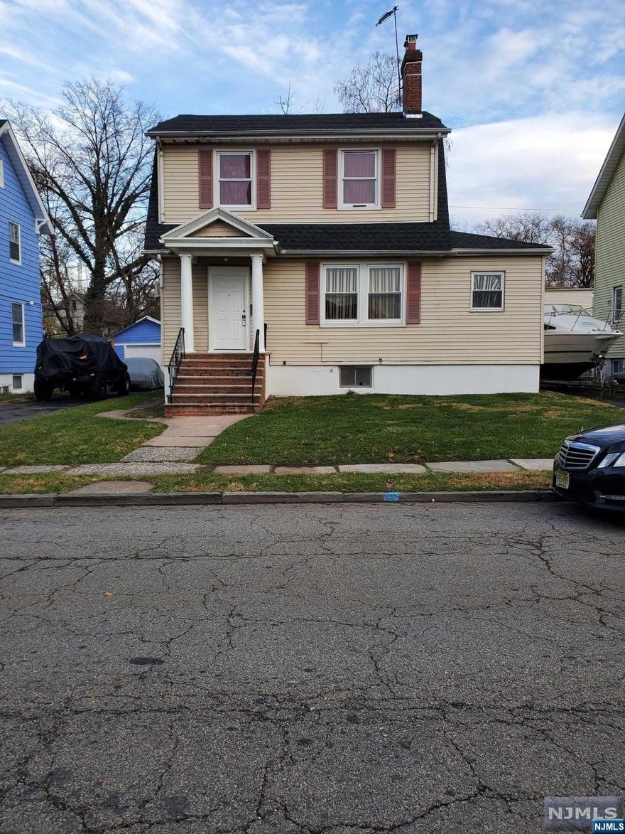 This newly renovated home is located in a quiet neighborhood where homeowners take proud in ownership. This home is waiting for its new owner to enjoy. The home has an open floor plan that shows off a beautiful floor to ceiling wood burning fireplace, new kitchen with granite countertops, center island, stainless-steel stove and refrigerator, (seller will give $1,000 credit towards dishwasher and microwave), open living room and dining area. Recessed lighting, several new windows and laminate flooring throughout. New roof, new central heating, dual a/c and new hot water tank. This 4-bedroom home features a 1st floor primary. There are two beautifully tiled full baths just waiting for you to enjoy. It offers a one car detached garage and full unfinished basement. The home is conveniently located to schools, shopping, public transportation and house of worships.