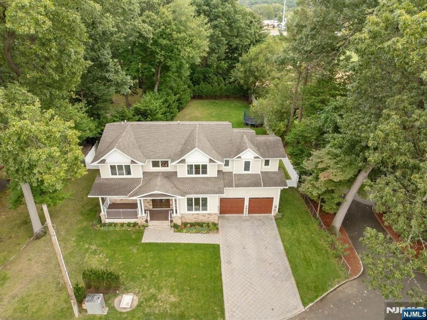 Discover your dream home in the heart of Cresskill! Built in 2016, this stunning 5-bedroom, 4.5-bath residence offers everything today's homeowners desire and need. Nestled on a peaceful cul-de-sac, the home boasts a spacious, private, landscaped backyard surrounded by natural beauty. Sunlight fills the open family room with a fireplace, flowing seamlessly into the gourmet kitchen & breakfast area through expansive windows. The kitchen is a true centerpiece, featuring top-tier appliances, an oversized Center Island, a walk-in pantry, and a convenient mudroom that leads to the garage. The grand two-story foyer leads to a serene living room and a formal dining room, complete with a butlerâ€™s pantry, perfect for entertaining in style. Upstairs, the luxurious primary suite features a spa-like bath and dual walk-in closets, as well as a junior suite with its own bath, two large bedrooms, and a laundry room. The finished lower level features a spacious recreation area, guest bedroom, full bath, and gym/officeâ€”perfect for entertaining or hosting extended family. Hardwood floors throughout, additional insulation, Whole-House Generator, 3-zone Gas HWBB, 2-zone C/A, C/V. Located just moments from top-rated schools, playgrounds, town pools, tennis courts, and parks, this home offers the perfect blend of luxury, comfort, and convenience.