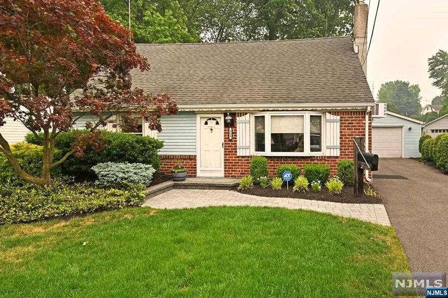 Mint condition, move in ready cape, on fabulous street, close to everything in desirable Maywood, NJ. Includes rare 2 car garage!! Impressive open layout on 1st flr from living rm & dining rooms w/hardwood flrs, to the large eat in kitchen, for great connected living. 3 BRs (1 on 1st flr, 2 on 2nd flr). 2 updated baths (1 full, 1 half). Immaculately kept! Other features include 2x Nest Thermostats, new hot water heater, generator, rear dormer, great backyard w/huge deck ready for years of outdoor gatherings & memories - gas line BBQ grill included! Large 2 car garage (a rare find in Maywood) w/plenty of storage & can even be used as a gym or other space if desired! All this plus beautiful curb appeal w/brick siding & attractive landscaping! Great walkability, close to schools, parks, NYC Bus, Maywoods famous downtown shopping street, & a few blocks from Bergen Town Center w/Target, Whole Foods, CVS & more! Great home in a great neighborhood - nothing to do but unpack! Dont miss!
