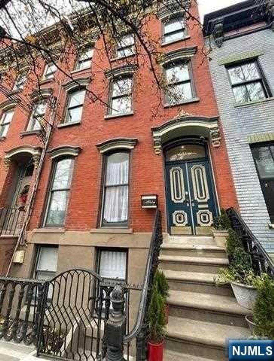 Charming 20ft wide rowhouse with two units. Each with renovated Hardwood floors, Kitchen, Bathrooms, Bedrooms and Laundry in each unit. Unit 1 has private access to backyard. Centrally located on 7th Street, between Park and Willow. This property can be an investment or converted into a one family. A must see! Call listing agent Evelyn Reynoso