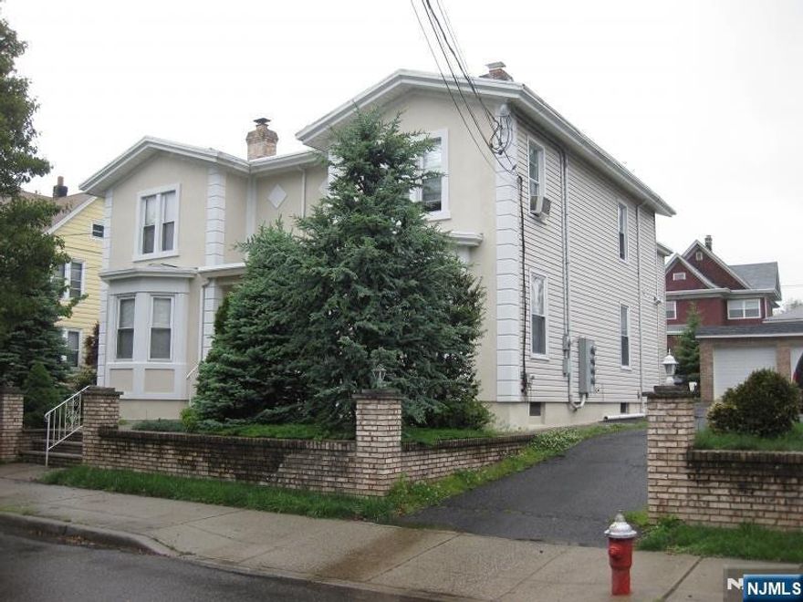 Renovated second floor unit offering 2 bedrooms, living room, eat-in-kitchen with stainless steel stove/oven and dishwasher. Full bath and walk in storage closet. One spot in garage and 2 parking spots in the driveway. Tenant has use of patio area and a coin operated washer and dryer on the premises. Located two blocks from the train station and centrally located near all major highways and shopping centers. Tenant pays for utilities (Gas and Electric). Landlord pays for water and sewer. Proof of income, Credit Check and Lease application. No pets allowed.