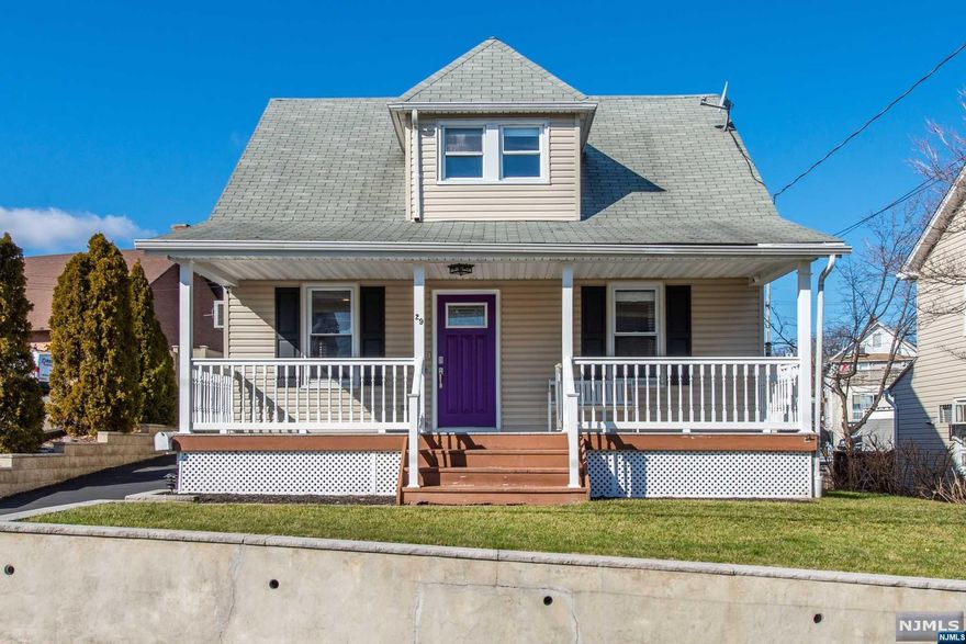 Adorable 3 bedroom, 2 bath Cape Cod in desirable section of Totowa just minutes away from the Grammar & Middle Schools! Only a few steps to the open front porch & beautiful purple door! First FL incl. open living room/dining room combo leading to gorgeously renovated kitchen in 2018 featuring quartz counters, water filter, & new cabinets & flooring. Two bedrooms & guest bathroom w/stall shower & rainfall shower head complete the main level. Primary suite takes over the 2nd floor, w/ sitting area, FB w/soaking tub, ample closets & additional storage! Other feat. incl. 1 car detected garage w/attic storage, laundry & storage in large waterproofed basement w/warranty, tankless hot water heater, fenced in backyard & new patio! NO FLOOD! Close to NYC transportation, shops & more!
