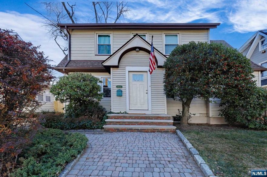 This beautifully renovated (5 Years) 3 bedroom, 3 bath colonial is conveniently located minutes from schools and parks, steps away from shopping and NYC transportation, and a short distance to houses of worship. The large living room with fireplace provides a warm and inviting atmosphere for gatherings with friends and family. The first floor also offers an updated eat-in kitchen with granite countertops, center aisle, stainless-steel appliances, and a full bathroom. The second floor has 3 bedrooms and a fully updated bathroom, large closets and a pull-down to the attic for more storage space. The finished basement with its 7.5 ft high ceiling, full bathroom, and open space is an ideal spot for entertaining. There are hardwood floors throughout, central AC, hot water heater (2022), a fenced-in backyard, covered deck and a shed. This home is a great option for anyone seeking comfortable living in a convenient location. With all the features and amenities offered.