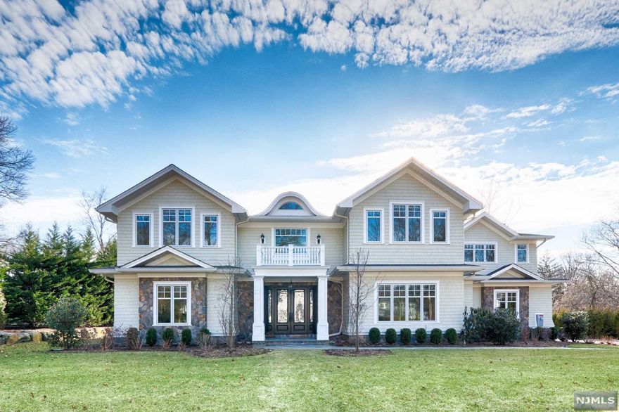 Stunning 2016 Greenwich style manor with sophisticated modern open interiors and smart house technologies. Refined interiors with high ceilings and beautiful hardwood flooring. Elegant double height foyer and great room with incredible views of the rear yard. Large white marble modern chef's kitchen with 14ft island, large pantry and eat-in area. Other features include paneled office, formal dining room with butlers pantry and main floor bedroom en suite. Five Beautiful bedroom en suites on the 2nd floor with laundry room and rear staircase. Finished lower level with home theater, gym, 2nd laundry room, large open play room and bedroom en suite. All interiors just painted. All hardwood floors refinished. 3 car heated garage, full house generator and poured concrete foundation. Hydro hot air system 6 zones, all tiled floors radiant heat. Stunning out-door living space with kitchen, fireplace, pergola and large lawn space. Room for pool! Stunning home & property!