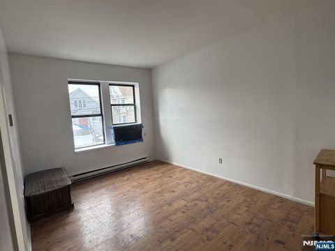Photo of 107 Frank E Rodgers Blvd #6, Harrison, NJ 07029 (MLS # 26004177)