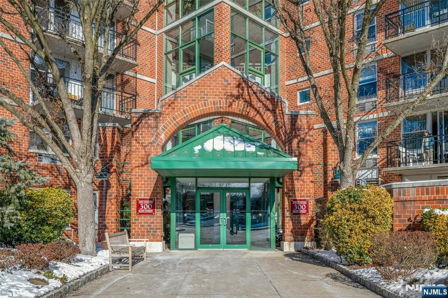 Welcome to an elegant and modern oasis at 300 Main Street, Unit 605, in Little Falls at The Mill. This exquisite 6th floor corner unit offers 2-bedroom, 2-bathroom residence, a sophisticated lifestyle with Mountain view and 2 balconies. The home features an open-concept living area, complemented by sleek and updated finishes and abundant natural light. Enjoy the convenience of a washer/dryer in-unit and air conditioning for year-round comfort. This unit has been fully renovated and has ample storage with 2 oversized closets, pantry and entryway closet.Residents have access to premium amenities on 11.84 acres of beautifully landscaped grounds. 2 elevators, gym, mail room in the building. Relax by the pool, unwind in your private outdoor space, or enjoy a match on the tennis court. With parking included and pet-friendly policies, this property is a perfect blend of luxury and convenience. Commute to NYC with options for NJ Transit bus just steps away and train 1 block away.