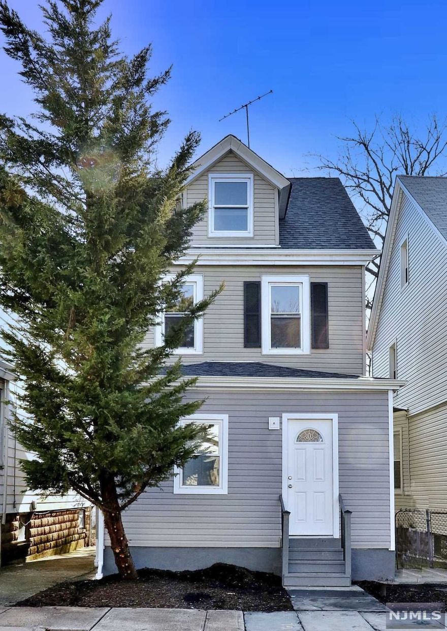 Welcome to this renovated Colonial in the Elmwood Section of East Orange. Enjoy being minutes away from the Brick Chch Train Station which utilizes the Morris-Essex Line and will have you into Manhattan in no time. This home has tons of space offering 4 levels of living. When you arrive, you will enjoy a closed-off front porch allowing for a comfortable view of the tree-lined neighborhood. Walking in the home, you will be impressed with the open concept living arrangement. Enjoy the expansive chef's kitchen with breakfast bar, SS appliances, and granite countertops with elegant pendant lighting over the BB seating. This gives an open & airy concept with sun-light kissing every corner with beautiful trim/finishes. You'll enjoy the gorgeous brand-new hardwood floors, central air, and preserved charm throughout. You'll have access to 4 well-appointed bedrooms with 2 finished bathrooms with new tile and fixtures. The basement is completely finished. This property will not last long!