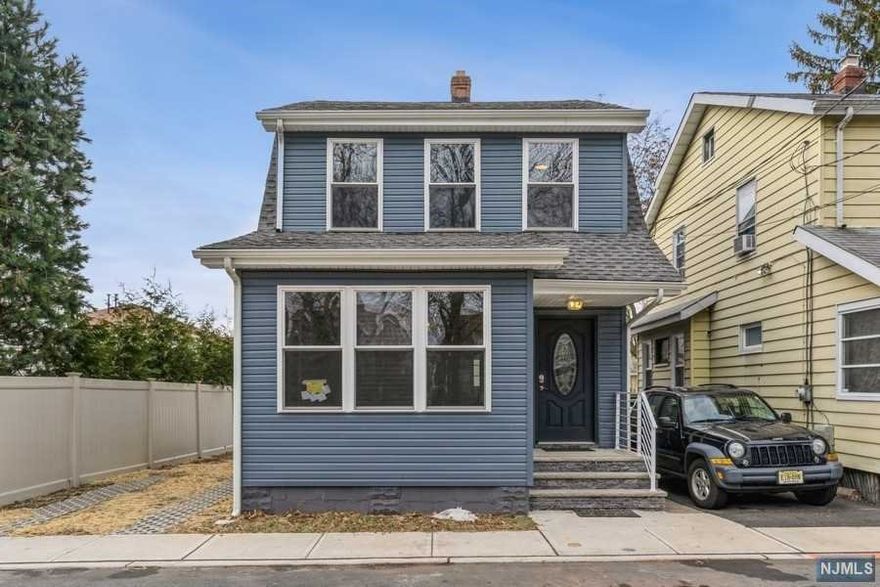 Fully renovated starter home, move in ready, on double lot, 3 car driveway,Backyard with newly installed pavers, newly constructed garage with an additional driveway. 1st floor features open concept living room and kitchen with island and quartz counter tops and brand new stainless steel appliances , half bath , and mud room that leads to the backyard. Full height finished basement with brand new washer and dryer. New Water heater and Furnace. 2nd floor features 2 bedrooms , and 1 additional room that can be used as an office. Full bath. Easy NYC commute, Close to all major Highways, 15 min drive to Newark Airport, Close to Kean University, and major store outlets .