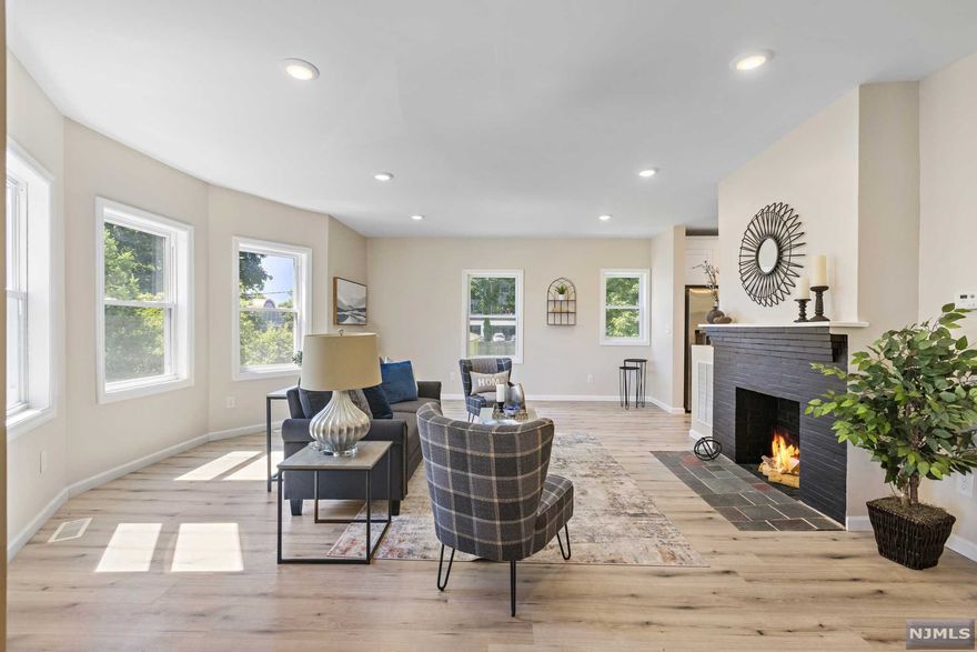 Truly one of a kind home opens its way & offers a lifetime opportunity to live & own in the exclusive Llewellyn Park. The exquisitely renovated & sun-filled home features 5 bedrooms, 3 full baths, 2 half baths, a finished basement & much more. An oversized living room with high ceilings, tons of windows, a stunning decorative fireplace. Spacious formal dining area that flows to a living room perfect for entertaining. Brand new white eat-in kitchen with gorgeous quartz counters offers tons of storage & is equipped with stainless steel appliances. On the 2nd floor, sun-drenched primary bed & ensuite bath with an additional den that can be customized to the owner's needs. Also, you can find two other well-sized bedrooms with a modern guest bathroom. While the 3rd fl presents an additional 2 guest bedrooms & huge flexible living space with oversized ceilings & tons of natural light & another stylish full bath. Easy access to NYC (only 12 miles) via train/bus.