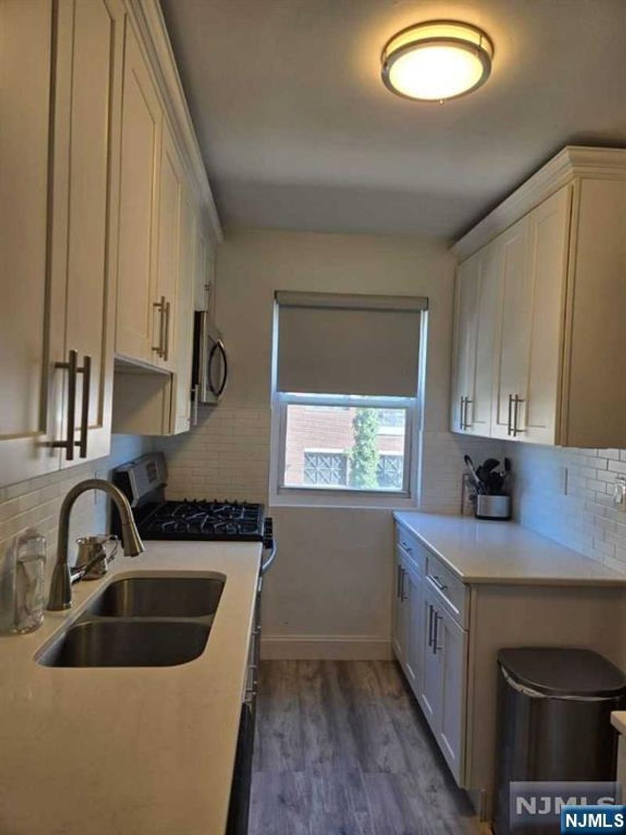 Third floor updated two bedroom apartment available. Great investment opportunity; tenant in place until Dec 31,2025 at $2450 a month. Great location, close to parks, house of worship, shopping, transportation and more. Unit comes with one parking spot (not designated; first come first serve).