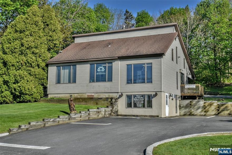 FANTASTIC ROAD TRAFFIC/VISIBILITY! WELCOME TO MCAFEE SECTION OF VERNON TOWNSHIP JUST MINUTES AWAY FROM MOUNTAIN CREEK RESORT! APPROX. 987 SQ. FT. OF SPACE PERFECT FOR MEDICAL/PROFESSIONAL/WELLNESS SPACE! ACCESS DIRECT FROM BACK PARKING LOT WITH NO STAIRS! THIS SUITE FEATURES A WAITING AREA w/ cathedral ceiling, RECEPTIONIST AREA, 1 LARGE SPACE/OFFICE, 2 SMALL OFFICES AND PRIVATE BATHROOM. FORMERLY A DOCTORS OFFICE. PERFECT SPACE FOR MEDICAL OR PROFESSIONAL BUSINESS. ONSITE PARKING AND SIGNAGE AVAILABLE JUST WAITING FOR YOUR COMPANY NAME! Measurements are approx and for reference only. Waiting Area w/high ceiling 25ft X 10.4 ft, Reception Area 8ft X 8.8ft, Large Space/Office 14.9ft X 13.3 ft, Office 14.10ft X 8.5ft, Office 9ft X 8.7ft, Bathroom. Tenant pays utilities (electricity, heat, hot water, internet) and flat rate monthly for exterior maintenance of $150. This property is also listed for sale.