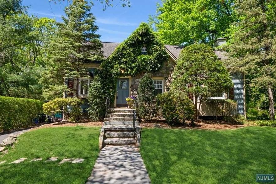 Charming Cape perfectly nestled on a beautifully landscaped lot, on a quiet cul-de-sac, in desirable town of Ramsey. Home features hardwood floors, living room, eat-in-kitchen including soapstone counter tops, oak cabinets & stainless appliances. Formal dining room displays stunning wainscot wood paneling. Step into your family room, perfect for holiday gatherings. Feature wall boasts 2 Palladian Arch Windows, a natural stone backdrop to showcase your wood burning stove & tastefully designed bay window w/seat. 4-season room offers floor to ceiling windows, ceramic tile flooring to overlook your 12'X30' deck & private backyard retreat. 2nd floor offers 2 bedrooms, full bath, spacious Master bedroom w/cathedral ceilings & skylights. Master bath w/Jacuzzi tub, separate shower & cedar linen closet. Basement & stairway features cedar walls w/storage nooks plus laundry & finished office. Storage shed for tools. Close to train, shopping, dining, schools & recreation.