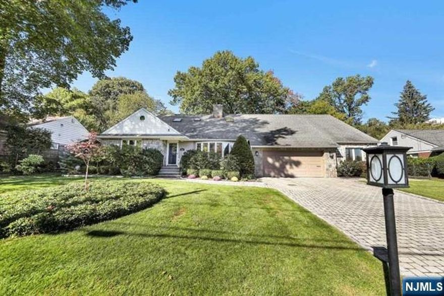 Custom Home rebuilt from ground up.Open floor plan;main level has Oversized Kit w plenty of cabinets and Granite counters, new Bosche DW & newer GE Profile Wall Oven & Micro; Grand Dining Rm has dual sided Gas Fpl to Family Rm w floor to ceiling stone; 2 sizeable Bdrms; 1 & 1/2 FulBA; and Lndry Rm/Mud Rm. 2nd level offers MstrBdrm Suite w Private FulBA,Jetted tub, European Stall Shower, Full Laundry closet and plentiful WIC; 2 generous Bdrms and Renov FulBA. Finished bsm't for additional living space has Owens Corning Wall Syst, Theatre area, Exercise area, and multi purpose area w cabinets/Granite Ctrs. 2 C A/C units. Pella windows w built in blinds, Intercom/stereo Syst, wireless internet, Gleaming wd Flrs, recessed lighting, Casablanca fans & more. Have fun in your resort like Fenced-in yard w newer installed heated in-ground pool,Large paver patio w electric awning,storage shed w elec & storage;2 Car Garage w GargTek Cabinets/Wall Syst.Desired Montclair Hts section