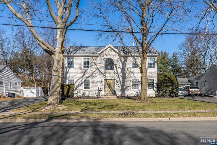 Welcome home! This beautiful center hall colonial features 5 total bedrooms (1 on the 1st level), 3 bathrooms ,finished basement and in ground pool. Upon entering the home into the two story entry foyer you'll find the formal living room, 1st floor guest bedroom and bathroom, formal dining room and large eat-in kitchen. Heading up to the 2nd floor there are three nicely sized bedrooms, full bathroom and primary en-suite bedroom with his/her closets and jacuzzi tub. The partially finished basement is perfect for entraining and features a bar area, storage and utility rooms. Around the exterior of the property you'll find mature landscaping, various fruit trees, patio and gunite pool. Recent updates include newly plastered pool and tile. Newer HVAC and 75gal. water heater, fresh paint and new carpeting. Conveniently located near NYC express bus and other local destinations, shopping, elementary & middle schools. Don't miss out, this great home will not last.