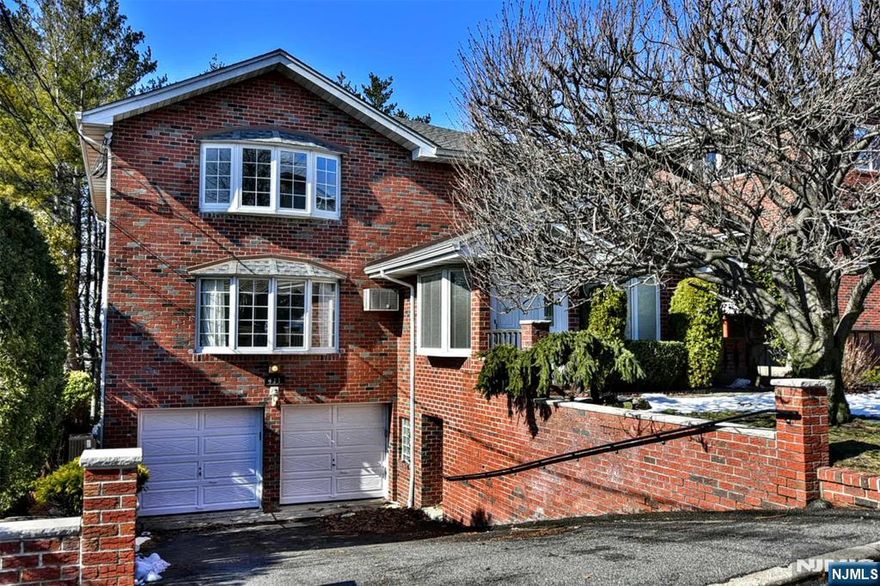 Welcome to this generously sized, versatile 4 BR, 3 bath rental located in the heart of Palisades Park. This home offers exceptional space and flexibility through out two floors of living area. Two full kitchens with all appliances included , two living rooms, a dining room and an abundance of bright natural sunlight throughout and more the ample closet space. Utilize a shared laundry room with the washer dryer already available to you. One garage parking space and one driveway parking space on an optionally heated driveway. Enjoy a well sized shared backyard for relaxing out doors with your own private patio . Located moments from NYC transportation. and bus stops. Pets are conditional on breed, size and case by case basis. No smoking. Tenant pays own utilities and a 1&1/2 month rental deposit is required. Credit check and interview are required.