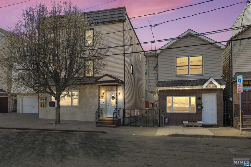 Rare Gem in Ironbound, Newark NJ: Two Buildings, One Extraordinary Opportunity! Step into a realm of unparalleled investment potential in the coveted Ironbound section of Newark, NJ. This is an avenue to owning not one, but two remarkable buildings on a single lot. Imagine owning a triplex with three units, each featuring 2 bedrooms and 1 bath. But it doesn't end there. The ground-level unit opens up to a fully finished basement, complete with an additional kitchen, bedroom, and full bath, setting the stage for lucrative rental possibilities. Adjacent to the triplex is a modern masterpiece: a single-family home crafted with precision just a decade ago. Revel in the luxury of two oversized bedrooms, boasting custom closets with built-in shelving, and two full baths designed for indulgence and relaxation. Parking headaches? Not here. With ample space in the rear and two detached garages, your tenants will thank you for the convenience. Schedule a tour today!