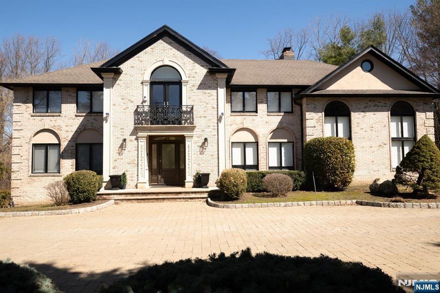 Welcome to this exceptional 5,100 sq foot residence set on a serene and private one acre property, nestled in the prestigious east hill of Cresskill. This elegant home offers the perfect blend of luxury, comfort, and modern living. An expansive first floor primary suite, modern eat-in kitchen, a sun-lit family room with fireplace, and a large deck overlooking the park-like grounds are just some of the beautiful features. 3 additional bedrooms, theater, oversized 3 car garage, finished basement, circular driveway, and so much more. Call Annitsa @ 201-406-3650 for more information.