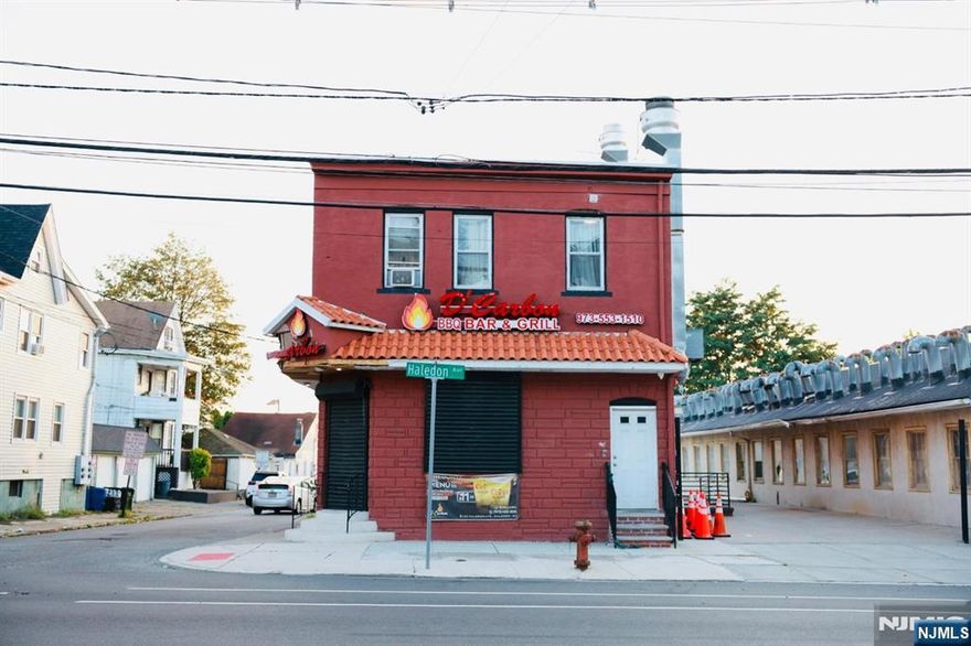 INVESTMENT or OWNER-USER OPPORTUNITY!!This income-producing property features two fully apartments upstairs and a turnkey restaurant on the ground floor. Parking is available for both residents and patrons. Residential unit # 1 is vacant and the Unit # 2 is rented MTM offering immediate cash flow. The Restaurant is ready for operation, complete soda lines, refrigeration, kitchen, full bar, basement office, and storage. LIQUOR LICENSE NOT INCLUDED IN THE SALE, BUT CAN BE PURCHASED ON ITS OWN FOR ADDED POTENTIAL! This property is just 1 Mile from William Paterson University . Value-add potential with rent increases and long-term leases. IT WILL NOT LAST!