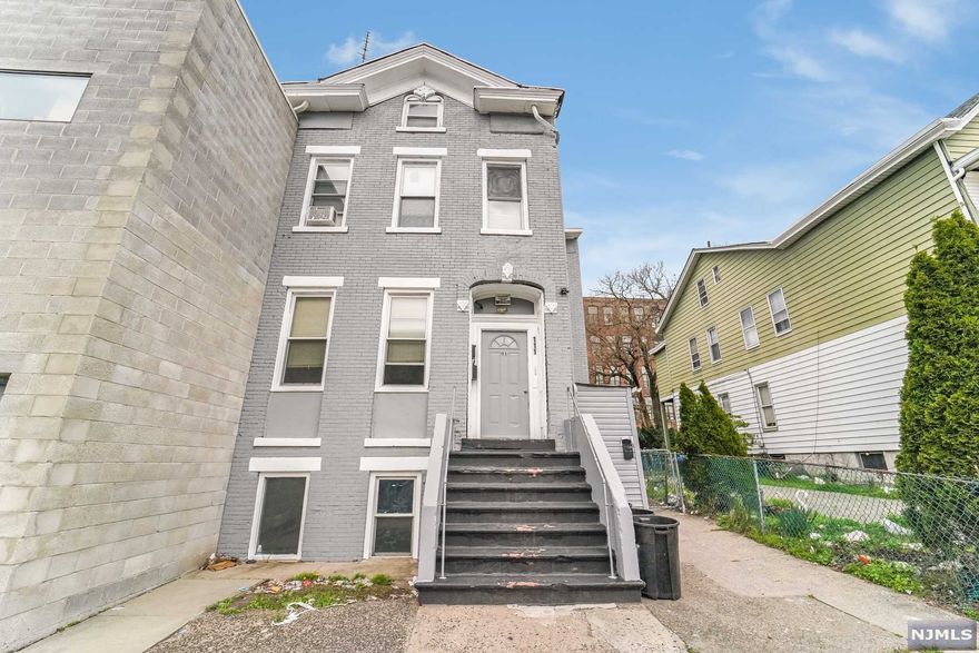 Well maintained 3 family investment property on measuring approximately 2,700 square feet. The property consists of a ground floor unit 2 bedroom 1 bath a main floor 2 bed 1 bath unit and a top floor 3 bedroom 1 bath duplex unit. The two bedroom units are occupied paying $1,400 each while the top floor duplex is paying $1,700 but will be vacant end of April. Situated a 9 minute walk to the Paterson Train Station and proximity to retail, restaurants and night life in Downtown Paterson. Positive cash flow day 1 with long term upside for a potential owner occupant. "The property is being sold as-is, where-is"