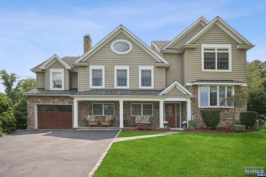 Spacious home is an entertainer's dream, boasting a wealth of amenities & elegant touches. Renovated & expanded in '09 its colonial split features include beautiful mahogany floors, new Andersen windows, an expanded eat-in kitchen w center island & radiant heat floors, a wet bar in the dining room, recessed lighting, & built-in sound system. The open LR, DR, & ground-level great room with a fireplace provide ideal spaces for relaxation & entertaining. There is also an additional room which is great as an office or game room. Also on this level is a full bathroom & sauna accessible from the pool. The basement includes a full exercise room with high ceilings. The primary bedroom is a private retreat with an en-suite bathroom & large custom closet. One additional en-suite bedroom, two other bedrooms, laundry room, & a full bath complete the second floor. A walk-up attic offers storage space or the potential for additional living area. With 5-zone. First showing 8/23/24