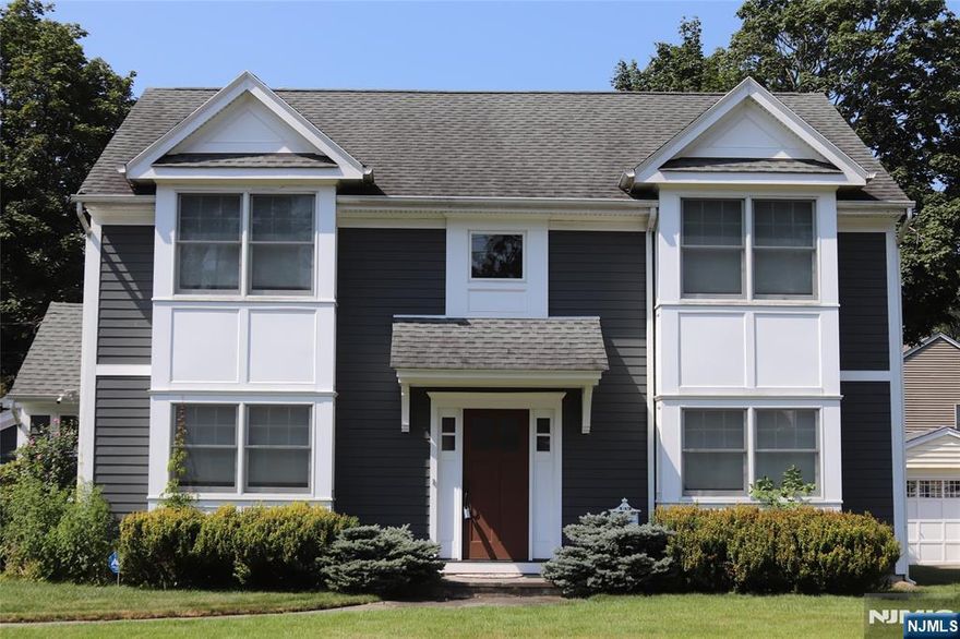 Don't miss this incredible opportunity in highly sought-after Wyckoff! This newly rebuilt Colonial in 2015 - thoughtfully constructed on the original foundation - blends modern craftsmanship with timeless charm. Step inside to discover an open-concept layout accented by gleaming hardwood floors. The spacious living room flows seamlessly into the dining area and kitchen, designed for both comfort and function. The kitchen boasts rich cherry cabinetry, granite countertops, a center island, and stainless steel Samsung appliances, and gas oven is a brand new. A sliding glass door off the dining area opens to a beautifully landscaped, private backyard featuring a bluestone patioâ€”ideal for relaxing or entertaining. The main level also includes a bedroom, powder room, and a practical laundry/mudroom. Upstairs, the bright and airy primary suite offers a walk-in closet, an additional closet, and a serene en-suite bath. Two generously sized bedrooms and a full hall bathroom complete the second floor. Additional highlights include Hardie siding, GAF Timberline roof, Andersen windows, Belgian block-lined driveway, bluestone walkways, and a fully fenced yard. A must see!