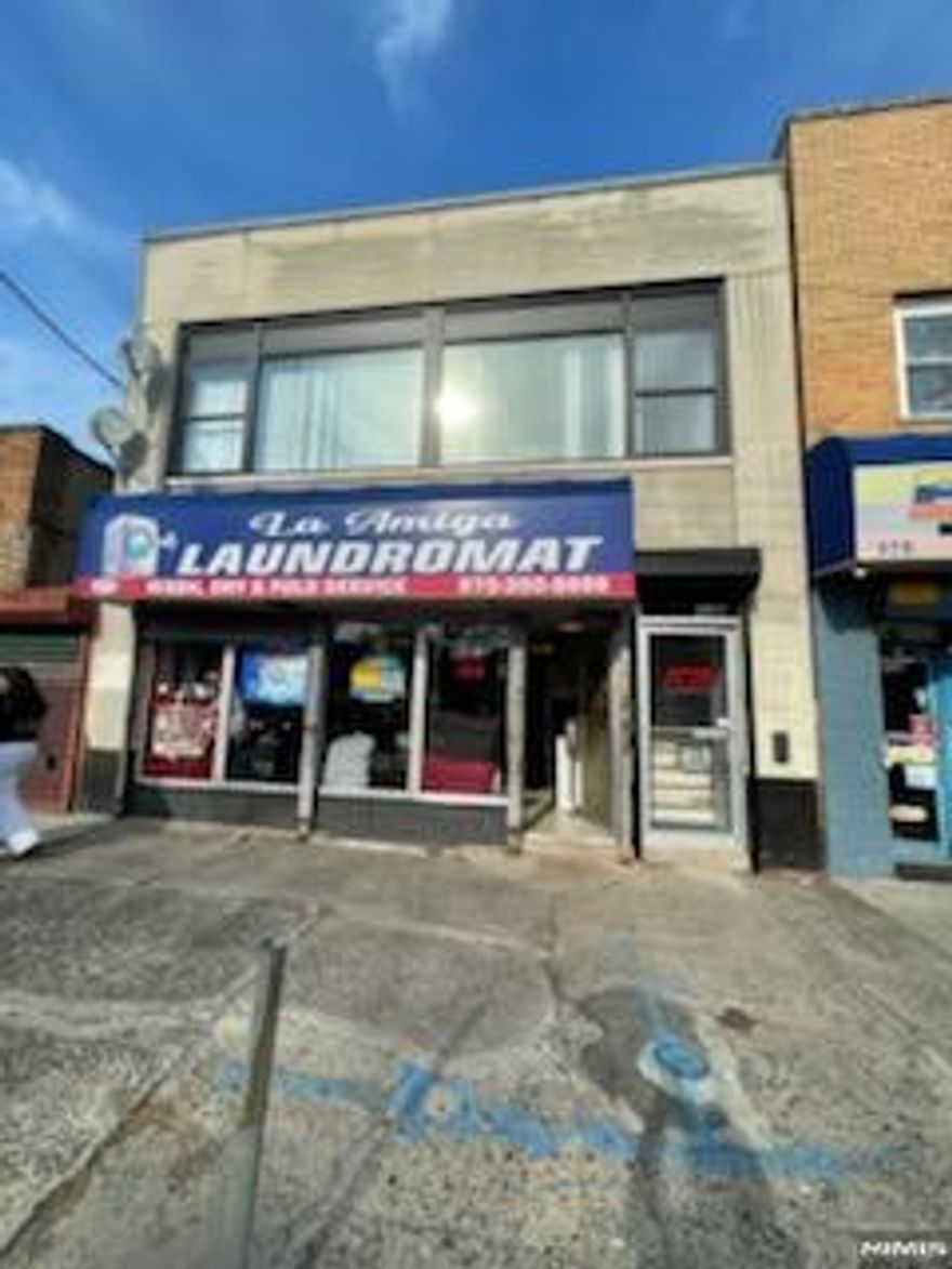 Well situated Commercial 4A 2 storey building (also community mixed use) consisting of 1,800 total s.f suitable for laundromat (plumbed for current use) or hair salon, with updated office (2025), full bathroom and kitchenette above. In the heart of the thriving Roseville section with lots of high visibility and foot traffic.. Second floor currently used as a trendy architect's office $2,500/month. . Laundromat $2,000/month with annual increases for additional 9 years.