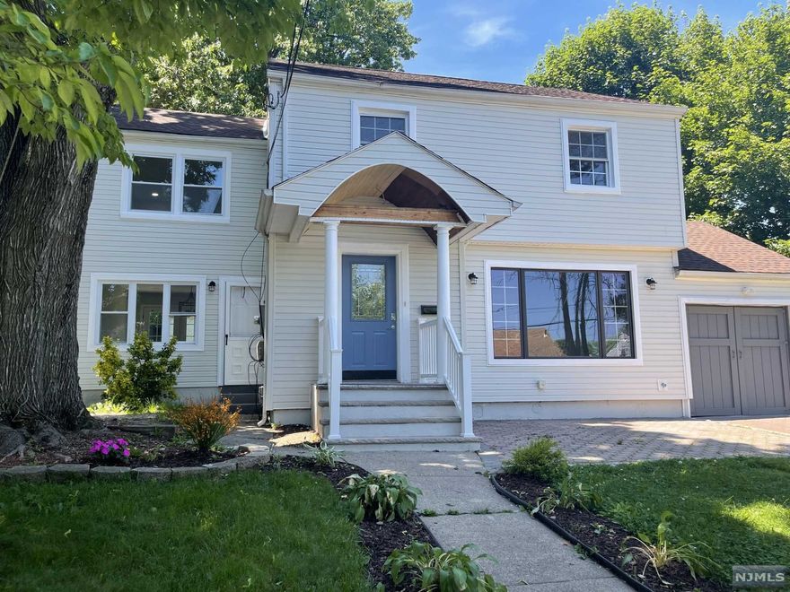 Welcome to this bright and spacious fully renovated side-hall colonial home. Located in a quiet street, yet close to schools, transportation, shops, etc. Great space for entertaining, 1st. fl. features a large living room with entry-ways leading up to an open-concept space which includes a beautiful all new kitchen with an eat-in island, a to lovely breakfast nook to the right and a dining room to the left with patio doors exiting to a paved patio in the rear yard. Second floor has 3 large bedrooms with ample closets, one new full bathroom, and a linen closet in hallway. Basement is fully finished open space with one new full Bathroom, large storage closet, and utility closet. Included in the renovation of this home: all new electrical and plumbing lines; New HVAC system (cooling and heating), New water heater, french drain and sum-pump. All hardwood floors refinished throughout. This great house is awaiting for a new family to call it their home!!