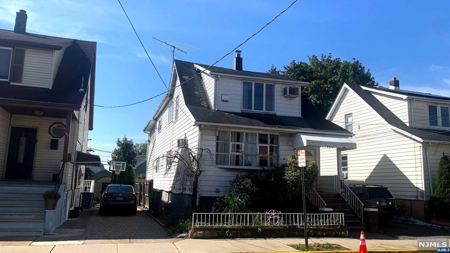 Amazing opportunity two family home in a great location. First unit boasts 3 beds, 2 baths, Living room and formal dining room. Second unit features 3 pretty good size bedrooms. Pretty large partially finished basement with playroom, full bath, laundry area with W&D hook ups and a unfinished storage space. Separate utilities. Home features driveway parking lot and backyard.