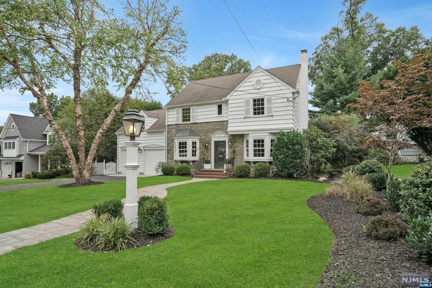 Nestled in the highly desirable Willard section of Ridgewood, this beautifully updated center hall colonial offers the perfect blend of classic elegance and modern convenience. 5 bedrooms, 2.5 baths, +/- 3200SF, with an additional 960SF in the basement. The brand new fully finished basement offers a versatile space. Enjoy the newly installed paver back patio and front and side walkways, perfect for outdoor dining or simply relaxing. Inside you will find custom lighting and brand new baths, all designed with thoughtful attention to detail. Gleaming hardwood floors with custom runners. The flexible room off the garage can be transformed into a mudroom, butler's pantry, or even a bar, giving you added convenience and storage. A den/home office is conveniently located off the family room, perfect for working from home. The new windows allow an abundance of natural light. This move-in ready colonial is located just min from top-rated schools. CONTACT JEFF 201-803-9624 FOR MORE INFO.