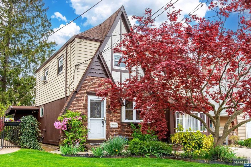 WELCOME HOME! 1930's Storybook Tudor Colonial Located in the Desirable Allwood Section of town! Tremendous Curb Appeal and just a short walk/ride to Shopping & NYC Bus. First Floor features; a formal LivRm w/Bay Window, Formal DinRm w/glass barn style doors to Cozy Sunken Family Room, Eat-in Kitchen w/Granite Counters & Large Pantry, Converted Garage Den/Office, Stylish Powder Room & Custom Mud Sorage Closet! Upstairs there are 3 Spacious BedRms & a Nice Renovated Bathroom! Finished Liesure Room and Laundry/Utility Room in Basement! Two Tiered Rear Deck, Fenced Yard & Storage Shed! Newer Roof, Upgraded Flooring, Wood accent & beam ceilings!
