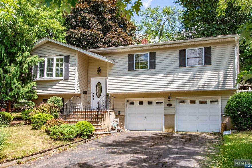 Welcome home to serenity in Woodland Park. Nestled on a quiet street, above all the hustle and bustle, this well-maintained bi-level home is your perfect retreat. Your expansive kitchen has a sliding door leading to your rear deck, perfect for entertaining. The first floor also has a comfortable dining room, spacious living room, all of your bedrooms, and the main bath. Head down a level to find your versatile ground floor with a rec room, an additional full bath, your laundry area, and a large, two-car attached garage. Make your appointment today to come visit this peaceful location.