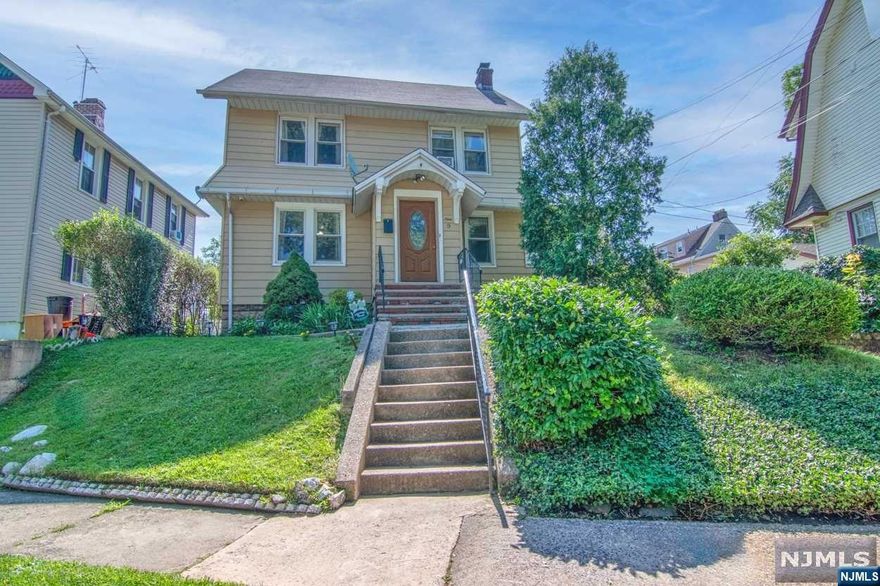 Beautiful and exquisite 5 bedroom colonial with breathtaking views of the stunning Watsessing Park. This home features a contemporary kitchen, an exceptionally large formal dining room, an open living room with a wood burning fireplace, a versatile 1st floor office/den, generously large bedrooms, finished basement with extra storage and a bonus rec room, 2 full modern bathrooms, and spacious yard enclosed by a fence, complete with a charming patio, entertainment dining area, and a shed.