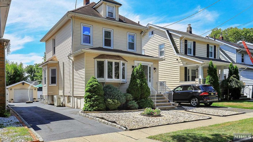 Charming 3 Bedroom & 2 Full Bath Colonial offers high ceilings, NEWER WINDOWS throughout w/TONS of natural light, NEW Furnace and NEW Hot Water Heater! Formal Dining Room is HUGE and offers 3 NEWER oversized windows and hardwood floors under the linoleum! Living Room offers Gorgeous hardwood floors with a beautiful NEWER bay window! The Eat-in Kitchen has beautiful Corian countertops with a breakfast bar! 1st Floor has window A/C. 2nd floor has Central A/C and offers 3 LARGE bedrooms (hardwood floors under carpet in 2 of the Bedrooms!) Backyard offers private vinyl fencing with a gorgeous above-ground pool, creating a serene setting perfect for entertaining! 5 Car Driveway w/Tandem Garage. NOTE: 1st Floor Wall A/C unit, Garage Door lock and Pool(no known issues w/pool) are sold in "as-is condition.