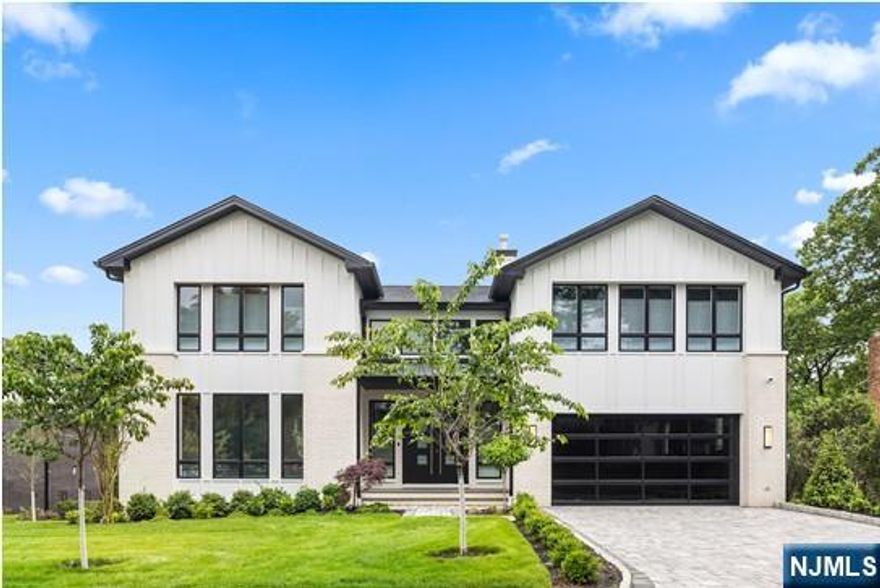 NEW CONSTRUCTION MODERN STYLE. OPEN FLOOR PLAN WITH 9FT. CEILINGS ON THE FIRST FLOOR. TWO STORY EF AND FAMILY ROOM WITH FIREPLACE, LARGE KITCHEN/DINING AREA, WITH QUARTZ ISLAND AND COUNTER TOPS, ALL STAINLESS STEEL APPLS, SUB-0 REFRIGERATOR. ALL BEDROOMS WITH EN SUITE BATH WITH RADIANT HEAT. PRIMARY SUITE WITH LARGE BEDROOM, FIREPLACE, LARGE CLOSETS, AND BATH WITH GLASS STALL SHOWER AND FREE STANDING BATH TUB. FIN BASEMENT WITH REC.ROOM WITH WET BAR, 1 BEDROOM, 1 BATH AND SLIDING GLASS DOOR TO YARD. OAK FLOORING, CUSTOMING CEILING AND STAIRWAY LIGHTING, PORCELANOSA, SPEAKER SYSTEM,CAMERA SECURITY, C/AC,VAC, 3 CAR GARAGE, LANDSCAPING, GENERAC GENERATOR. CONTEMPORARY DESIGN, DEEP YARD AND A GREAT QUIET LOCATION. PREMIER BUILDER, BUILDING LUXURY HOMES SINCE 1981.