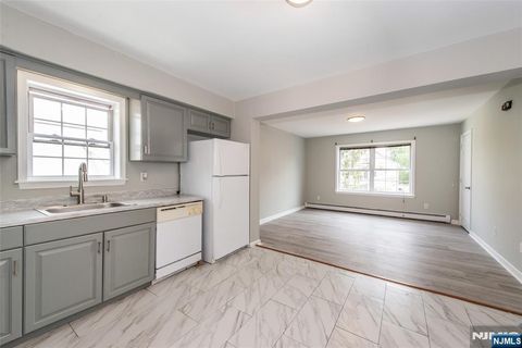 Photo of 294 Paxton St, Paterson, NJ 07503 (MLS # 26015600)