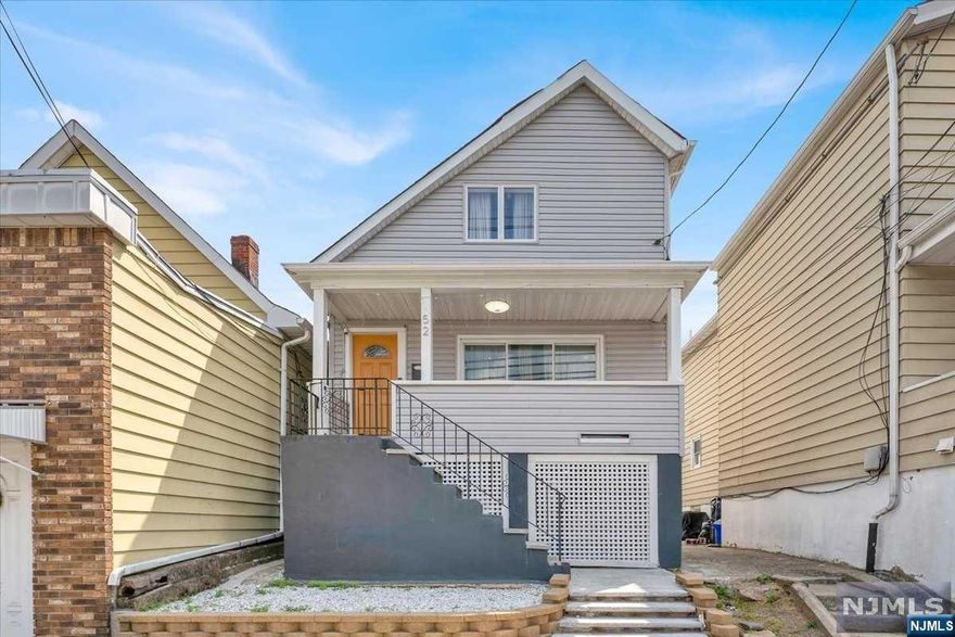 Welcome to 52 Jewell St, a beautiful and spacious home located in the heart of Garfield, New Jersey. As you step inside, you are greeted by a bright and inviting living space, featuring an open floor plan that seamlessly connects the living room, dining area, and kitchen. The living room boasts large windows that fill the space with natural light, creating a warm and cozy atmosphere for relaxation and entertainment. The kitchen with sleek countertops, ample cabinet storage, and a suite of stainless steel appliances. Prepare delicious meals and gather around the dining area, where you can enjoy family dinners or entertain friends. This home offers three spacious bedrooms, each offering a peaceful retreat for rest and relaxation. The additional bedrooms can be used as cozy sleeping quarters, home offices, or hobby rooms to suit your lifestyle needs. The finished basement offers a bedroom, full bathroom, living space/laundry room. You don't want to miss this beautiful home!