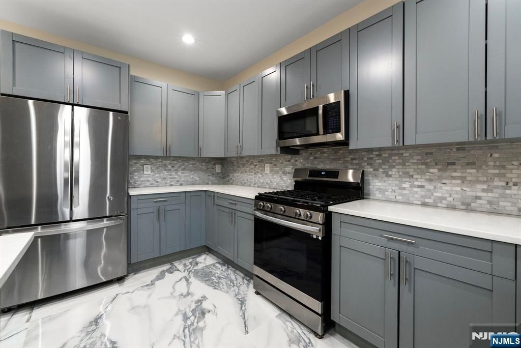 Photo of 3013 High Street, Fair Lawn, NJ 07410 (MLS # 26001143)