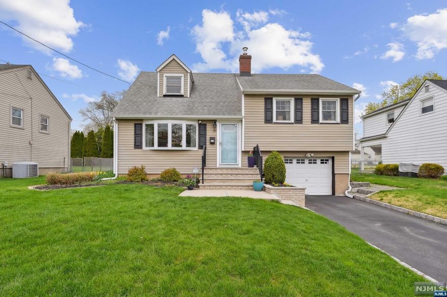 Immaculate 4 bedroom split, on quiet cul de sac street at very North End near Clifton and Upper Montclair Lines. The house offers 1 full and 2 modern half baths, a modern kitchen, newer gas heat and central air, hard wood floors, sliders to beautiful composite deck overlooking private fully fenced rear yard. The 2nd floor offers two bedrooms and full bath, the third has two bedrooms and half bath. There is a finished basement with new half bath. The exterior is vinyl siding, a one car garage, all thermal windows and doors, and security system. Owner has a green thumb and you will find beautiful flowering plantings abound.