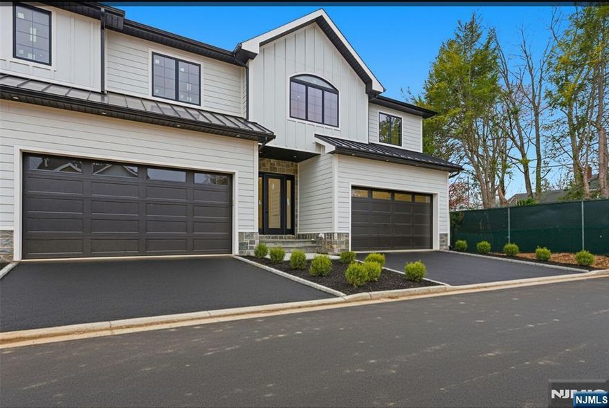 *Enter â€œ95 County Rdâ€ into your navigation app, as the new address does not currently appear* Welcome to an exclusive new 8-unit townhouse community, where luxury meets nature in perfect harmony. Nestled in a serene setting with top-rated schools, convenient access to NYC, and a wealth of dining and shopping options minutes away, this custom-built townhome is the epitome of refined living. Set for completion in February 2026, each residence offers impeccable finishes throughout including over 4000 square feet of living area! Upon entry, you're greeted by a designer kitchen, a sophisticated living and dining area, and a family room that opens to a picturesque patio. Upstairs, you'll find two bedrooms with a shared hall bath, a junior suite with a private bath, and the expansive primary suite, featuring a spa-like en suite bathroom and walk-in closet. The fully finished basement is designed for comfort, boasting a home office, rec room, family room, and an additional full bathroom. Experience the blend of community charm and modern luxury at Cedar Lux Development Complex! Property taxes estimated to be between $25,000-$27,500