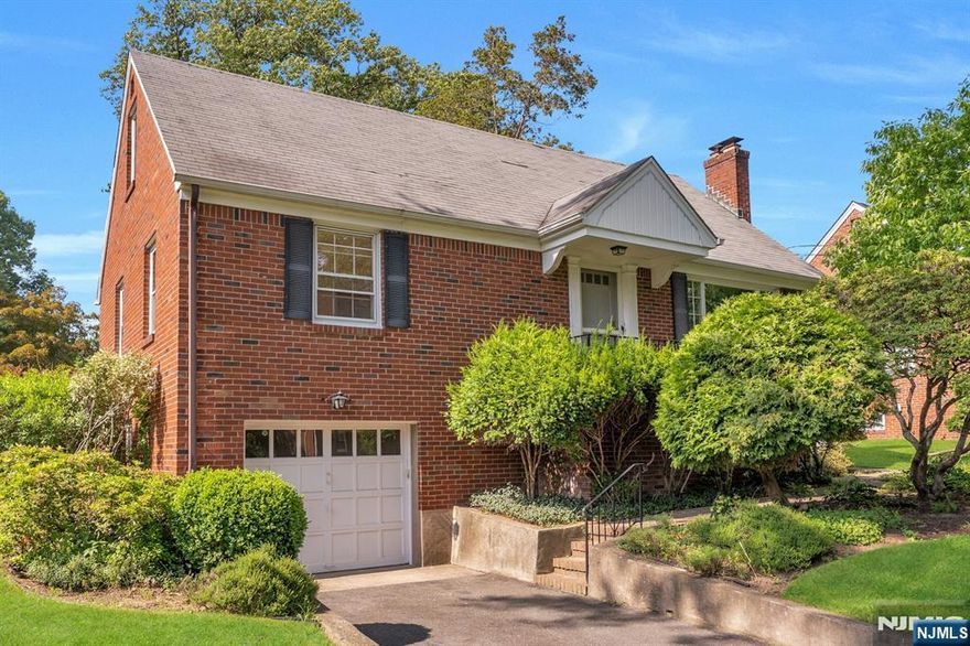 Tucked away on a desirable cul-de-sac location in Hawthorne, this classic VanDenBerg brick Cape Cod blends timeless charm with everyday comfort.Hardwood floors flow through the main level, which offers a cozy living room with a wood-burning fireplace, a formal dining room, two bedrooms, and a full bath.Original built-in cabinetry and shelving add character to both the living and dining areas.Upstairs, two oversized bedrooms one approx. 18'x17' are complemented by a second full bath and offer space for guests, work, or play.The high-ceiling basement with laundry provides excellent storage or finishing potentialThe level backyard features a two-tier deck, concrete patio, and spacious lawn areas.This is a well-built home with character and potential ready for new owners to make it their own. Located in one of Passaic County's most welcoming towns, Hawthorne offers a small-town feel with great schools, parks, and easy NYC commuting via nearby train and bus lines.