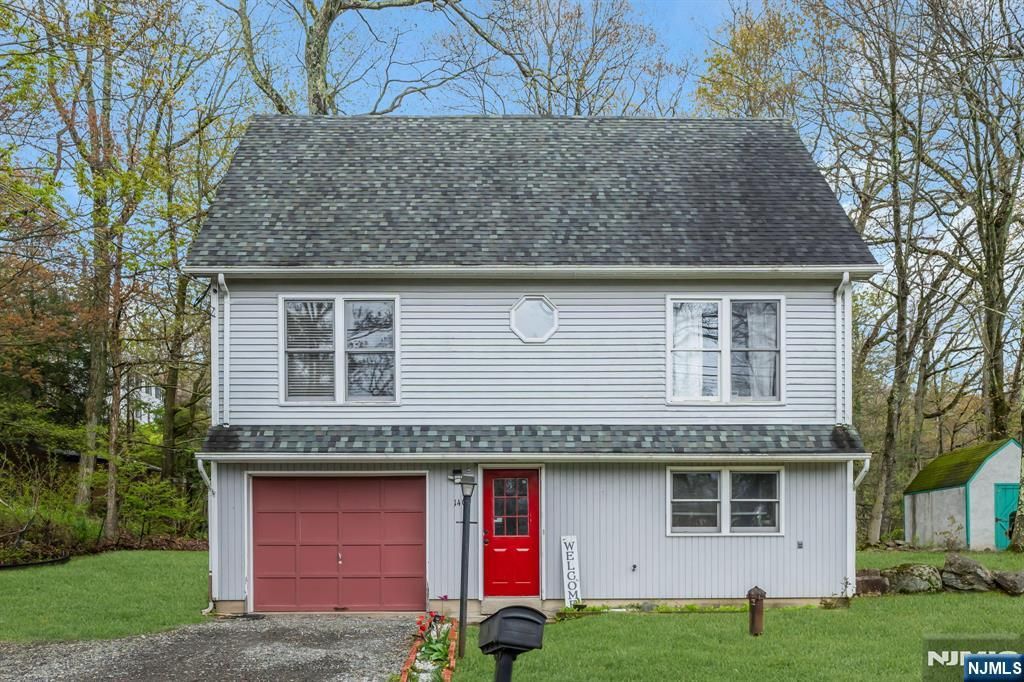 Photo of 140 Papscoe Road, West Milford, NJ 07421 (MLS # 26016447)