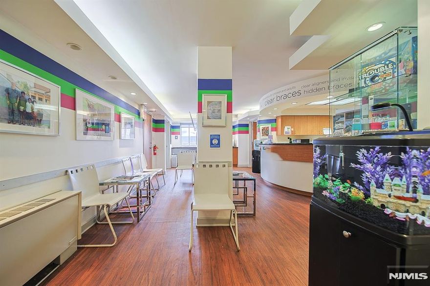 Approximately 1,800 square feet of professional space available in a highly desirable and well-established cooperative building. Currently configured and operating as an waiting office, this suite is well suited for continued medical use, but also offers excellent flexibility for a wide range of medical, dental, or professional practices. The space features a practical layout designed for patient flow and day-to-day operations, along with a separate private entrance that provides added convenience and privacy for both clients and staff. With generous square footage and an existing professional setup, it offers an excellent opportunity for practitioners seeking a functional and adaptable office environment. Located in a phenomenal, highly accessible location, the property benefits from strong visibility and easy access for patients and visitors. Not to mention, the unit is located directly across from the Fort Lee High School making its location a landmark essentially. NYC transportation and access to the bridge is essentially at your fingertips as well. Monthly maintenance is $1,729, which includes utilities, homeowner association dues, and real estate taxes, providing predictable operating costs. In addition, dorman services along with 24 hour security is provided. This is an outstanding opportunity to establish or relocate a medical, dental, or professional office in a sought-after building with excellent accessibility and built-in convenience.