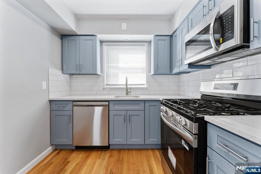 Brand new fully renovated 2-bedroom, 2 bath multi-generational apartment. Enjoy brand new stainless steel appliances, quartz countertops, hardwood flooring, new energy-efficient windows, fully remodeled kitchen with dishwasher, and fully remodeled bathroom on the 1st floor. This also has a surprise fully finished basement with studio, second kitchen, and full bath. The layout creates a bright, welcoming atmosphere ideal for relaxing or entertaining. Close to local restaurants, cafes, and schools. Easy NYC bus transportation. 1 parking spot in driveway. Washer/dryer hook up in basement. Use of yard. This home truly has it all, modern updates, and great location. Don't miss out! Schedule your private showing today and make this your new home! It is available immediately.