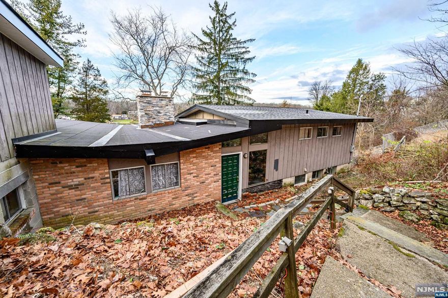 Lakefront Living!! This 4 Bed 3.5 Bath Custom Home is awaiting your personal touch. Offering an Open Floor Plan & Stone Fireplace that covers the Living Room, Dining Room, and Den area, perfect to cozy up to on a cool night. The Family room holds a stone accent wall and sliding doors leading to the tranquil Lake. Eat in Kitchen with separate dining area. 4 generously sized bedrooms. NEWER Roof, Exterior Lights, & Electrical Box. Don't wait, with a little TLC you can transform this into your dream home. Come & See!!