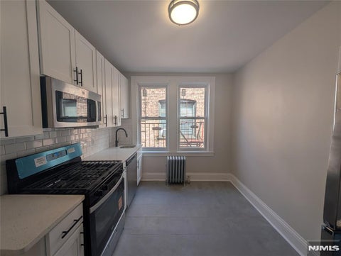 Photo of 173179 Madison Ave #C5, Passaic, NJ 07055 (MLS # 26033254)