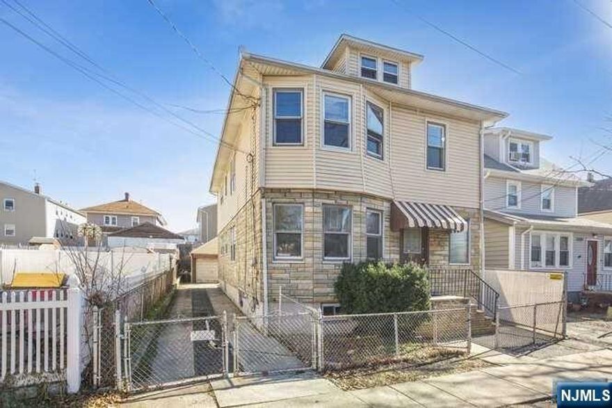 Coming Soon! Great Investment Two Family Home! Features 2 & 3 Bedroom Apts. with a Bright livingroom, Formal Diningroom, Eat in Kitchen, Bath, Central air & all separate utilities. Second fl has been totally updated, freshly painted & wood floors throughout. Large attic can be finished for additional living space. The beautiful full finished basement boasts a full bath, tiled floors and a private entrance. Separate Laundry room for both units. One car garage and a long driveway can accommodate 3 cars. Great location, close to NY Bus, Train, Shopping, Restaurants & Airport. Will Not Last! Delayed showings until Feb 11.